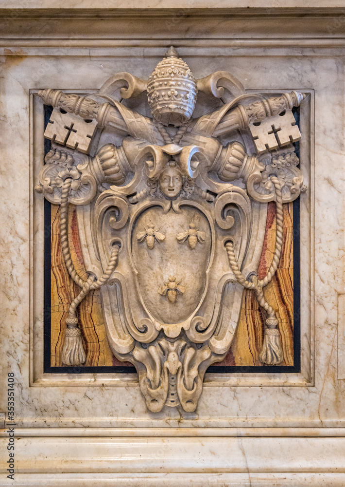 Pope Urban VIII coat of arms in Saint Peters Basilica in Rome, Italy.