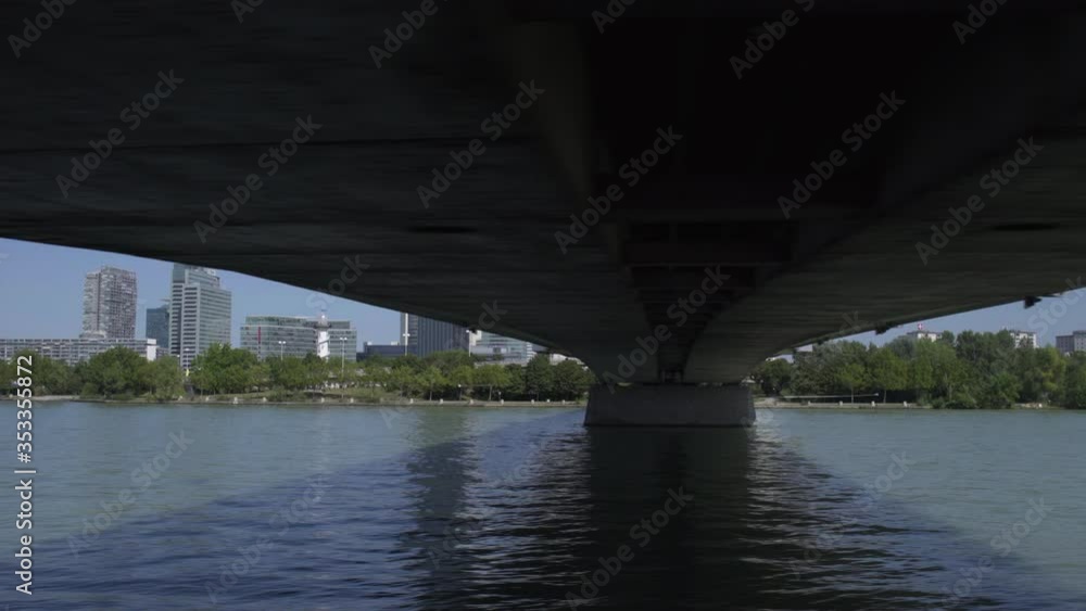 Vienna, Moving shot under bridge over danube with DC Tower 1, Austria Vienna, Moving shot under bridge over danube with DC Tower 1, Austria
