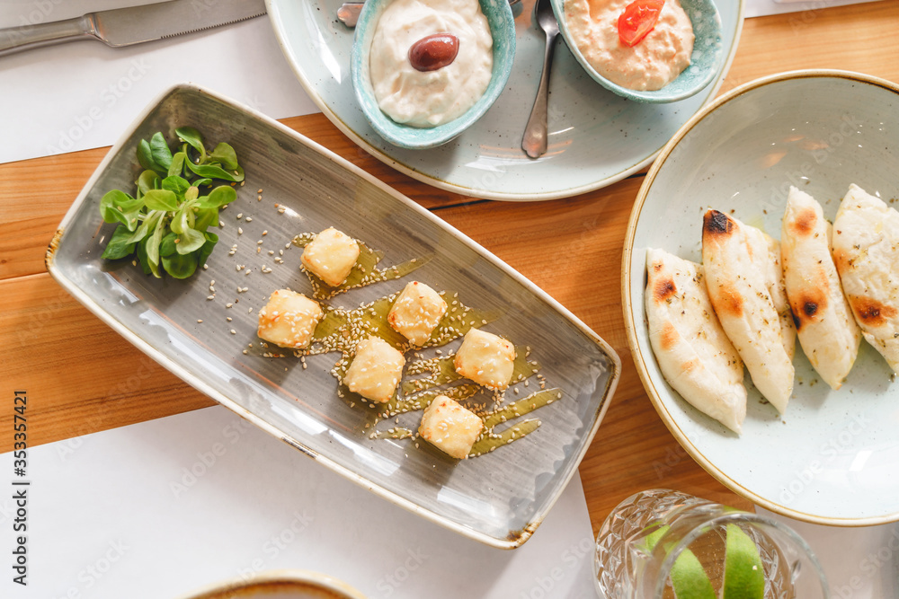 Plates of delicious healthy food in cafe Plates of delicious healthy food in cafe