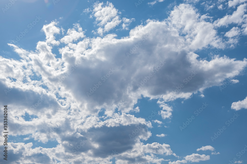 Obraz premium blue sky with clouds and sun