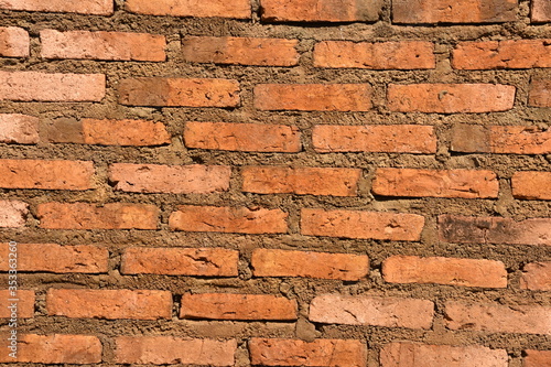 Light Red Brick Wall with Brown Grout