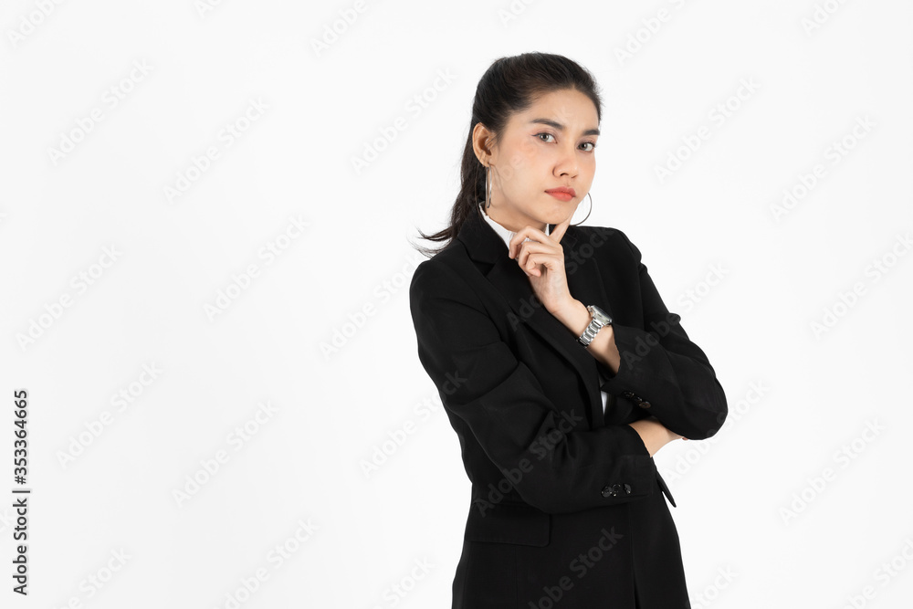 Confident young Asian business woman in suit having good idea expression over white isolated background. Confident young Asian business woman in suit having good idea expression over white isolated background.