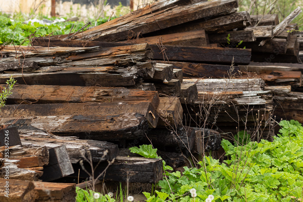 Old wooden railway sleepers. Broken remains of railway. Old abandoned railway, broken rails. Old wooden railway sleepers. Broken remains of railway. Old abandoned railway, broken rails.