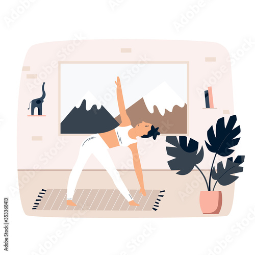 Young pretty girl doing yoga at home