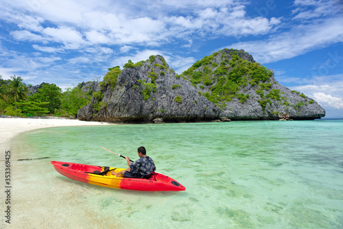 Kayaking tourists In the beautiful sea