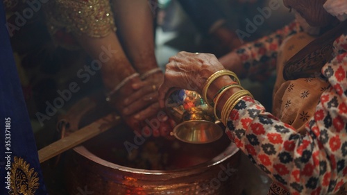 A ceremony of washing feet to the bride before her marriage by her female relatives, Nepali and Hindu ritual, tradition, culture, religious, Brahmin cast system, wedding day in Nepal, India