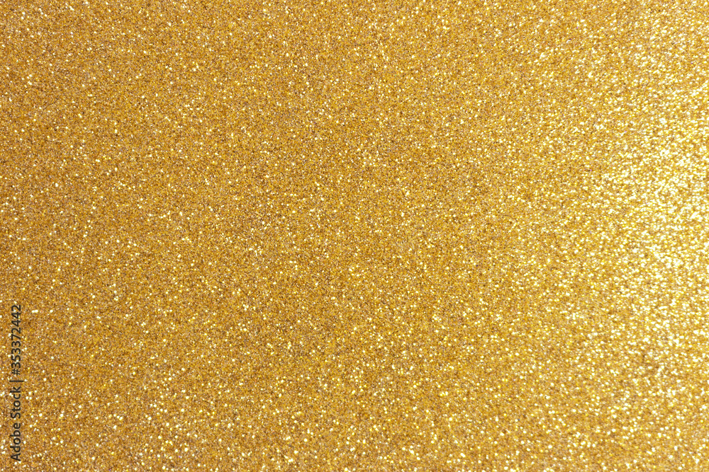 Golden glitter texture background. Shiny festive backdrop. Golden glitter texture background. Shiny festive backdrop.
