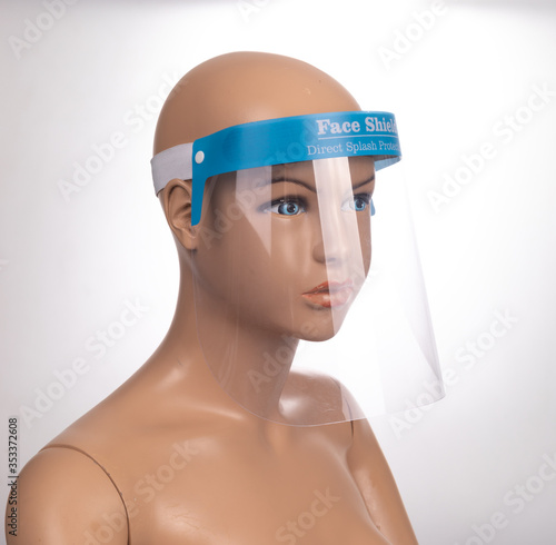 Medical face mask or shield. Transparent plastic helmet. Coronavirus quarantine concept. Protective measures for flu. Virus outbreak prevention and pollution protection
