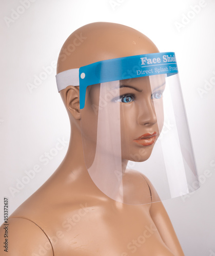 Medical face mask or shield. Transparent plastic helmet. Coronavirus quarantine concept. Protective measures for flu. Virus outbreak prevention and pollution protection

