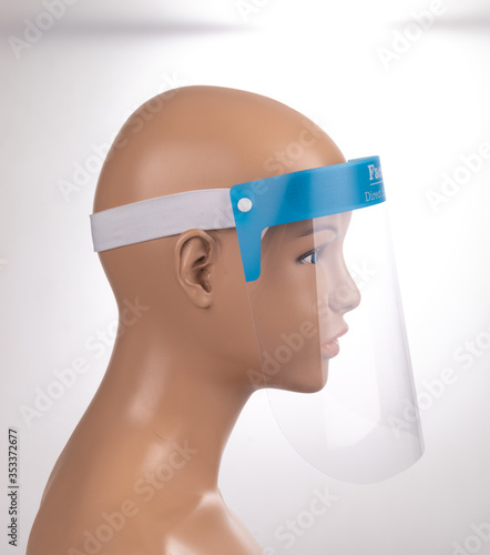 Medical face mask or shield. Transparent plastic helmet. Coronavirus quarantine concept. Protective measures for flu. Virus outbreak prevention and pollution protection
