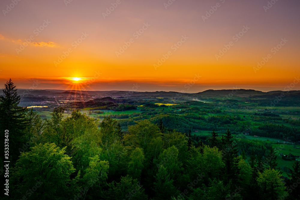 Zachód słońca widziany z Sokolika Wielkiego, w Rudawach Janowickich w Polsce. Sunset, seen from Sokolik Wielki top, in Rudawy Janowickie Mountains in Poland Zachód słońca widziany z Sokolika Wielkiego, w Rudawach Janowickich w Polsce. Sunset, seen from Sokolik Wielki top, in Rudawy Janowickie Mountains in Poland