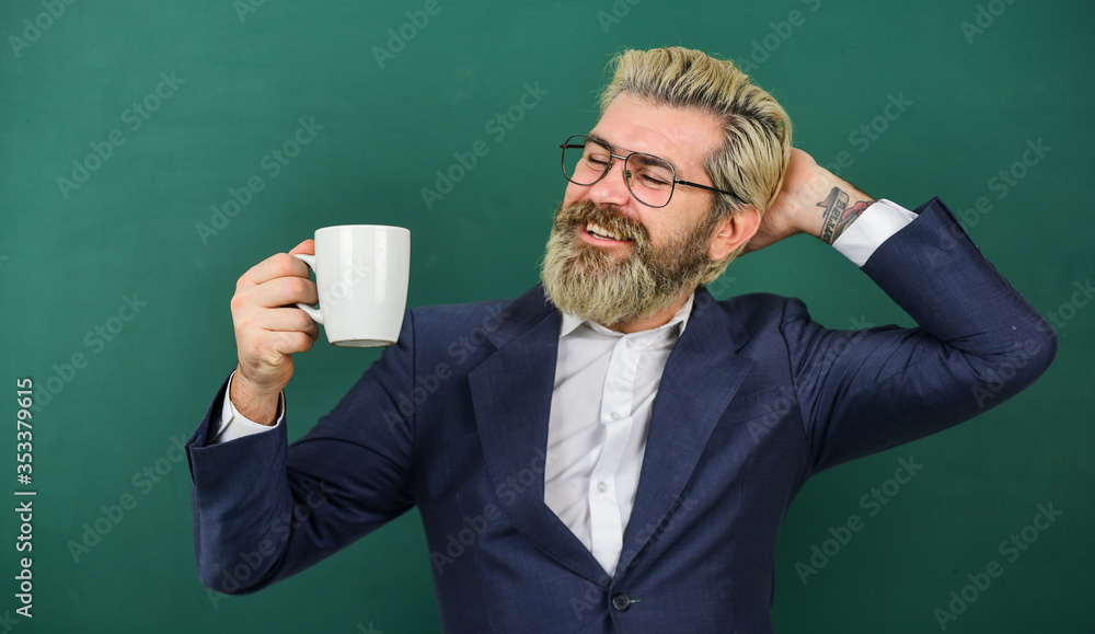 Keep calm and take break. Bearded man hold coffee cup. Enjoying school break. Happy teacher enjoy coffee break. Break time. Morning and breakfast. Resting and relaxing. Coffee boosts brain function Keep calm and take break. Bearded man hold coffee cup. Enjoying school break. Happy teacher enjoy coffee break. Break time. Morning and breakfast. Resting and relaxing. Coffee boosts brain function