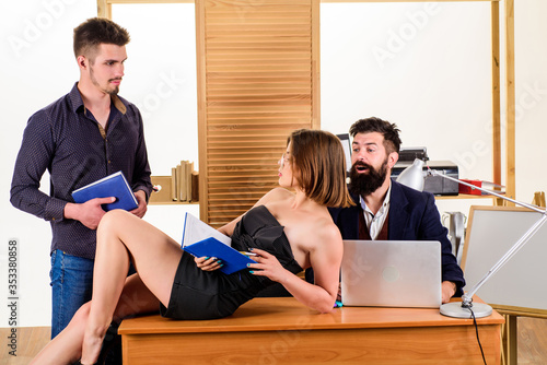 Stimulate sexual desire. Woman working in mostly male collective. Intentional sexual provocation. Woman attractive lady working with men colleagues. Office atmosphere concept. Sexual attraction