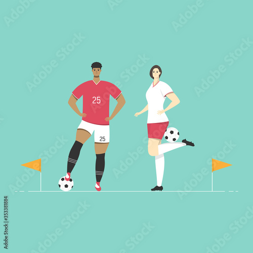 Male and Female football player standing with the ball.