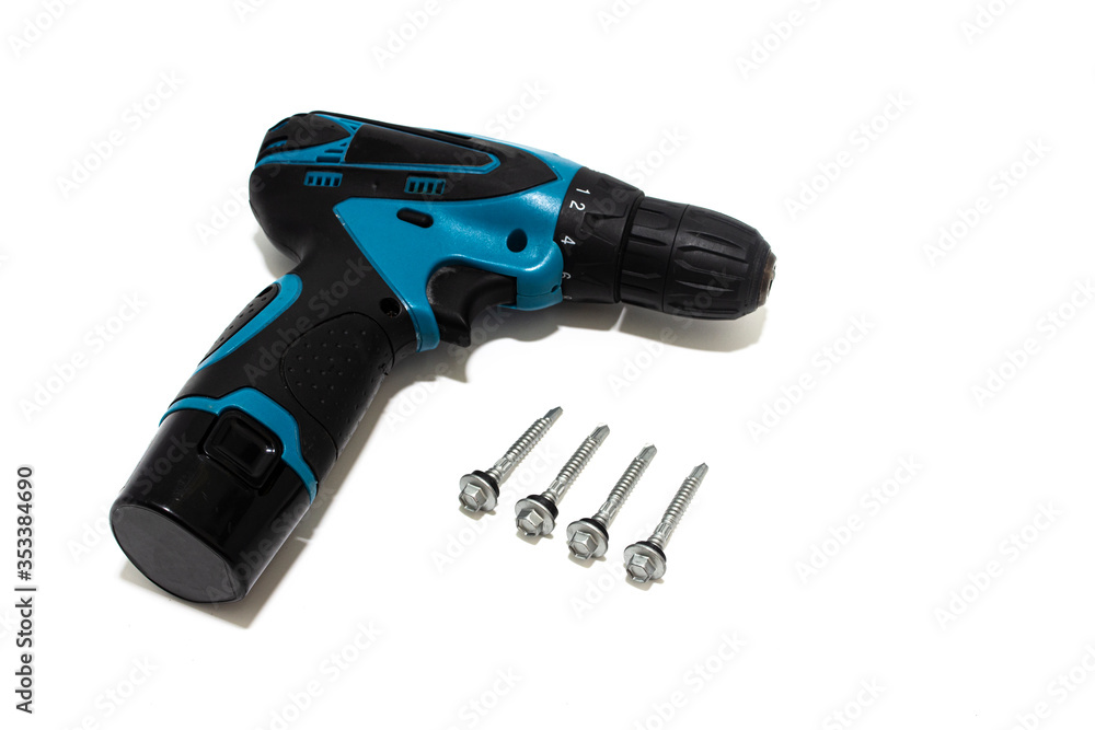 Screws and drill isolated on a white background, tapping screws made od steel. Screws and drill isolated on a white background, tapping screws made od steel.