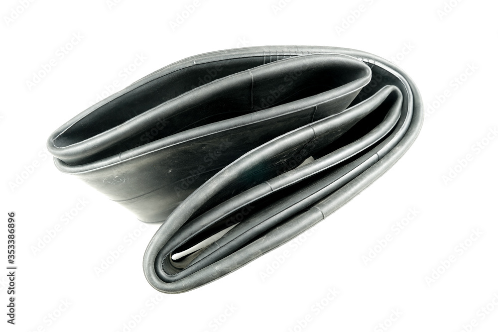 The inner tube of the motorcycle is isolated on a white background. The inner tube of the motorcycle is isolated on a white background.