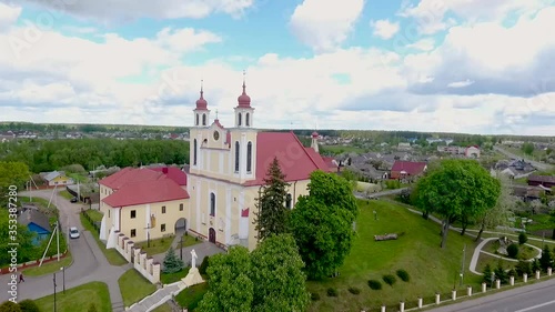 Saints Peter and Paul Church. Ivye, Belarus. Drone aerial view video photo