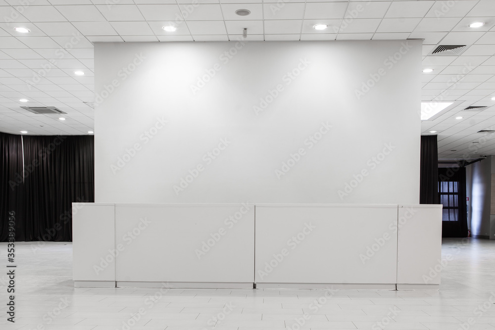 Spacious white industrial space with ceiling and place for text Spacious white industrial space with ceiling and place for text