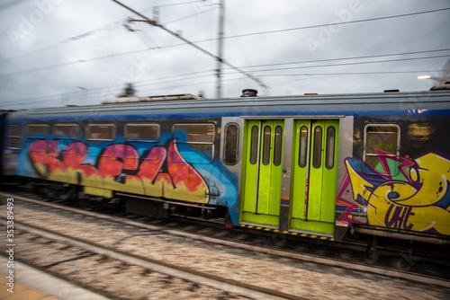colorful trains at the station in speed