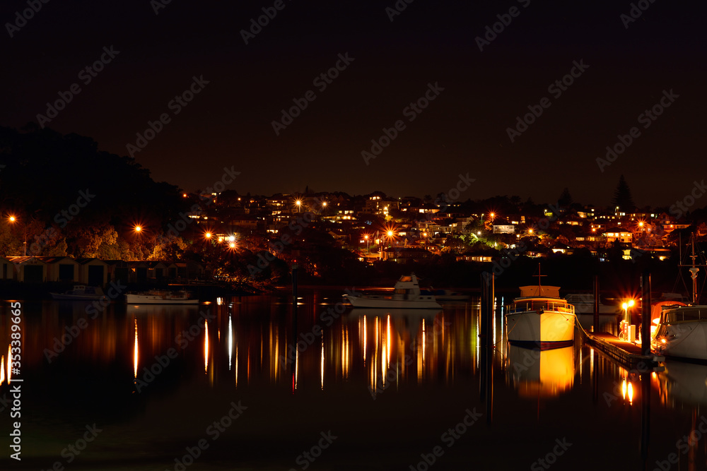 View over Hobson Bay and suburb of Orakei at night. Auckland, New Zealand.