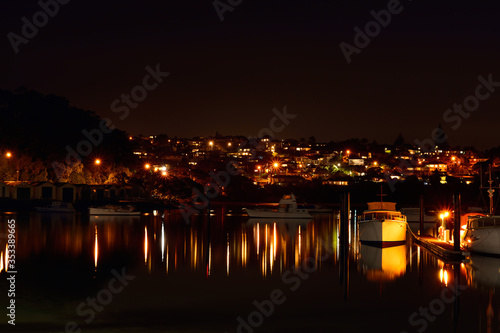 View over Hobson Bay and suburb of Orakei at night. Auckland, New Zealand. © Irina B
