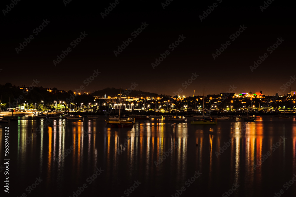 View over Okahu Bay and suburbs at night. Auckland, New Zealand. View over Okahu Bay and suburbs at night. Auckland, New Zealand.