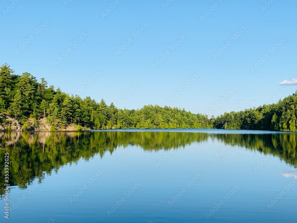 Reflections on Meech Lake, situated in Gatineau Park, Quebec, Canada. 