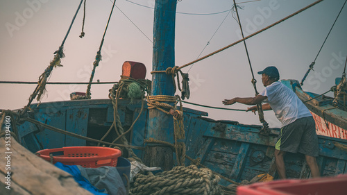 Life of Fishermen on Goan Dock photo