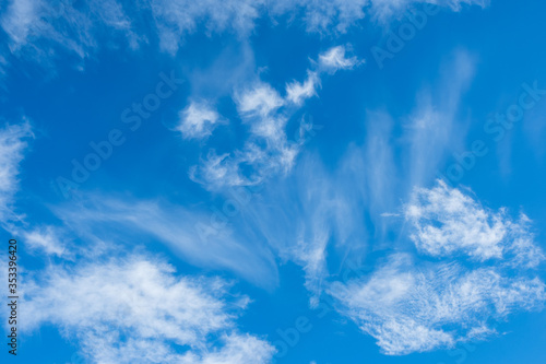 Beautiful white clouds at blue sky background
