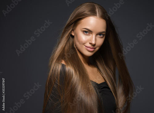 Beautiful smooth long hair woman natural make up face portrait beauty