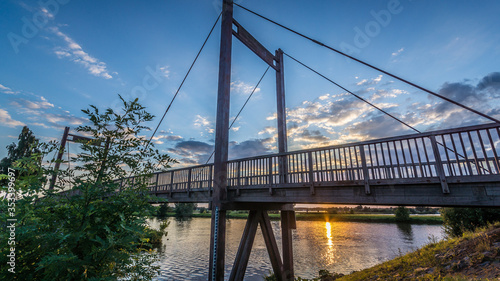 Bridge over the Hambeek in the city of Roermond, in the province of Limburg, The Netherlands. River Meuse in the background.
