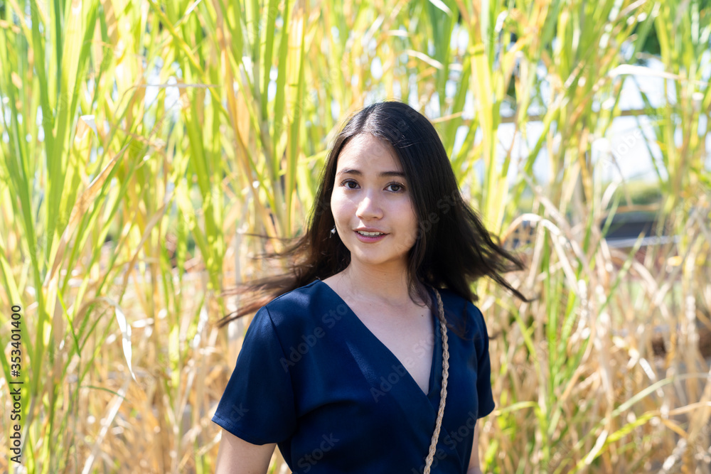 Hair flick woman and tall grass. Hair flick woman and tall grass.