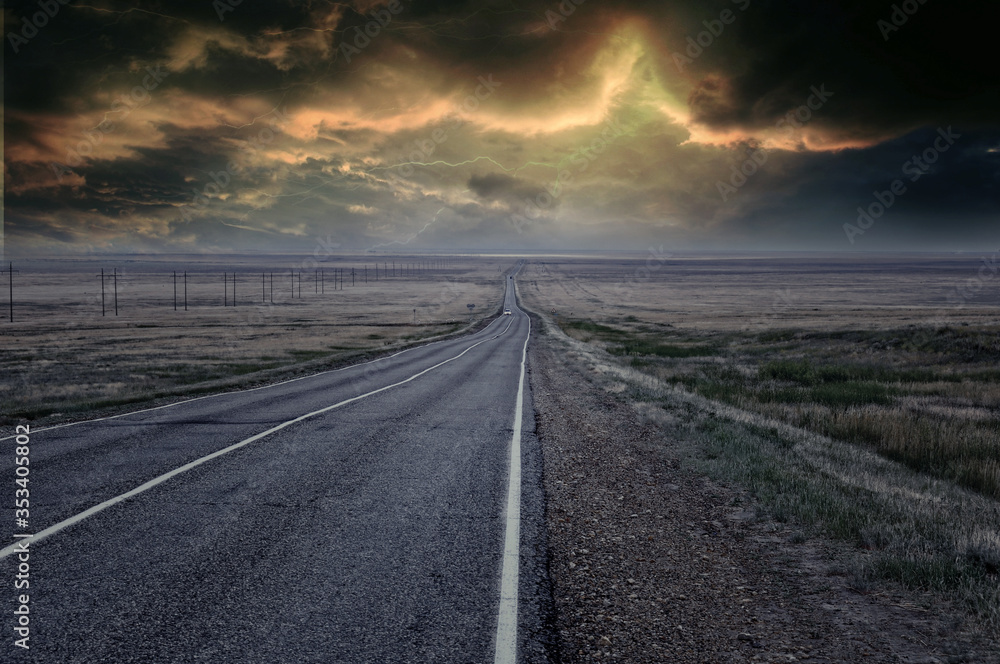 an auto trip through the steppes of Kalmykia during a thunderstorm