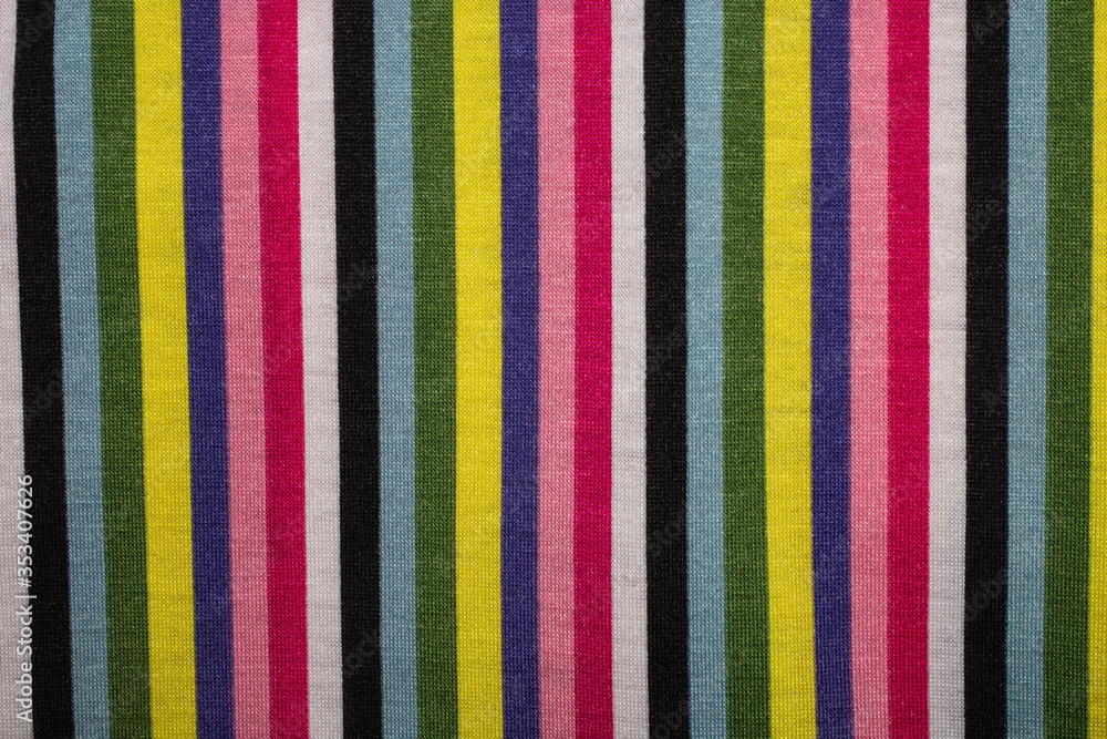 Multicolored striped fabric texture as background Multicolored striped fabric texture as background