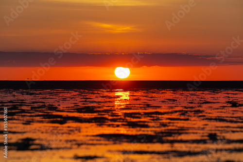 Fototapeta Naklejka Na Ścianę i Meble -  Sea and sunset along the coastline at Hin Kong Beach Phangan Island, Thailand. Feb 05 2019