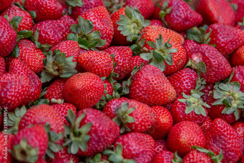
strawberries for sale in a public market