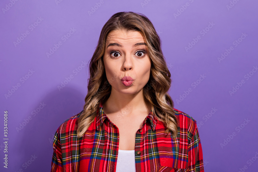 Close-up portrait of her she nice attractive lovely pretty cute funny girl wearing checked shirt sending air kiss isolated over bright vivid shine vibrant lilac violet purple color background Close-up portrait of her she nice attractive lovely pretty cute funny girl wearing checked shirt sending air kiss isolated over bright vivid shine vibrant lilac violet purple color background