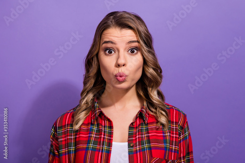 Close-up portrait of her she nice attractive lovely pretty cute funny girl wearing checked shirt sending air kiss isolated over bright vivid shine vibrant lilac violet purple color background