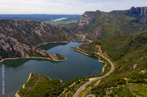 Aerial drone view of lake and mountains in Andorra