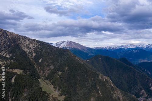 Aerial drone view of mountains in Andorra with snow on top