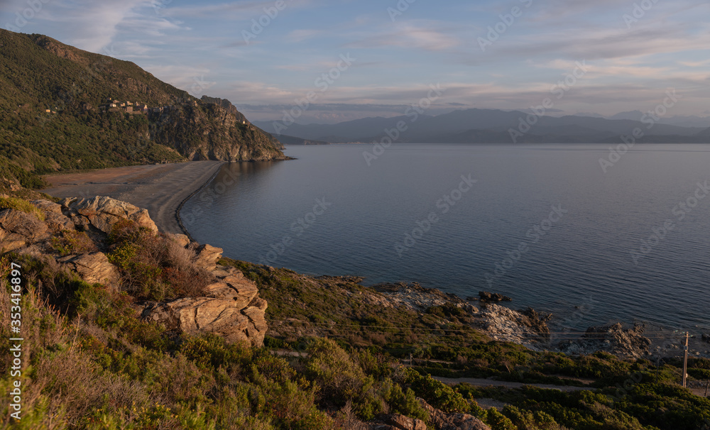 Corsican Coastline.  Maquis, rocks and the black beach of Nonza, in the Cap Corse