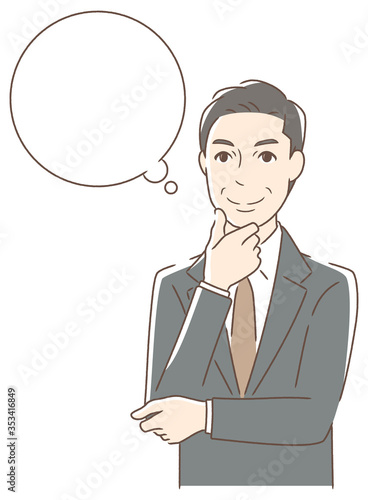 笑顔で想像する男性