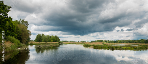 Deszczowe chmury nad stawem Andrzej photo