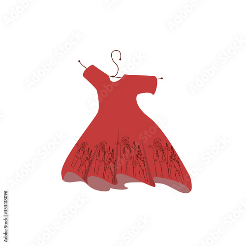 Wavering red dress with a print of meadow grass. photo