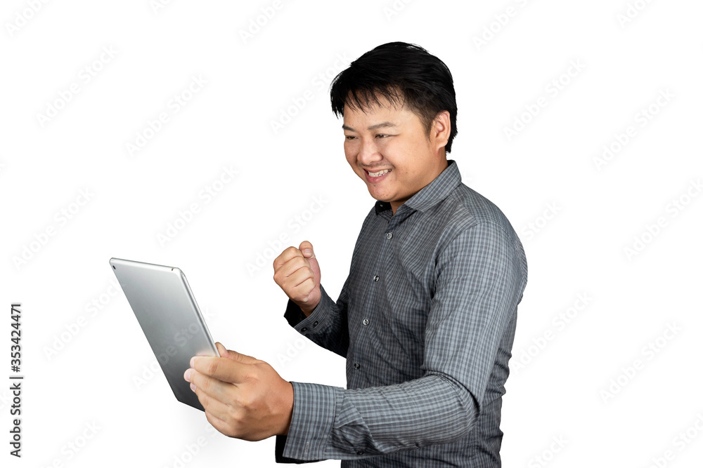 Portrait male handsome asia thailand office worker Wear striped shirt hand holding the tablet smiling, happy the success feeling isolated on a white background clipping path Portrait male handsome asia thailand office worker Wear striped shirt hand holding the tablet smiling, happy the success feeling isolated on a white background clipping path