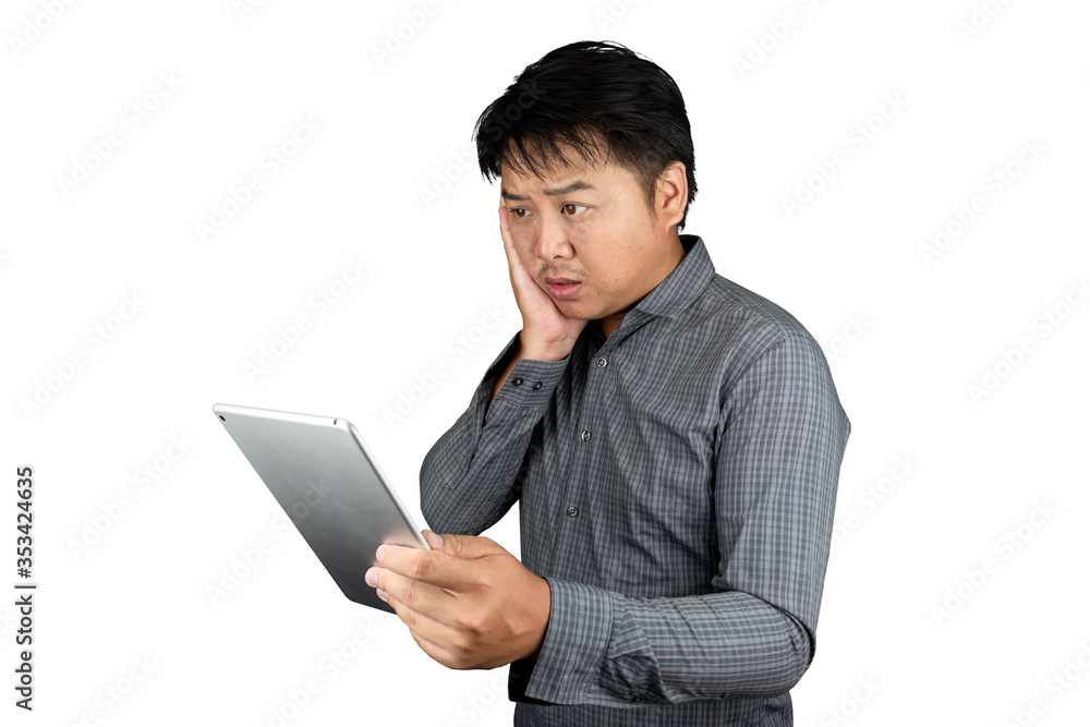 Portrait male asia handsome office worker Wear striped shirt hand holding the tablet overwork tired having headache caused unhappiness and disappointment feeling isolated on a white background Portrait male asia handsome office worker Wear striped shirt hand holding the tablet overwork tired having headache caused unhappiness and disappointment feeling isolated on a white background