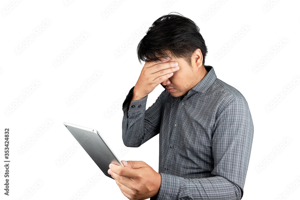 Portrait male asia handsome office worker Wear striped shirt hand holding the tablet overwork tired having headache caused unhappiness and disappointment feeling isolated on a white background Portrait male asia handsome office worker Wear striped shirt hand holding the tablet overwork tired having headache caused unhappiness and disappointment feeling isolated on a white background