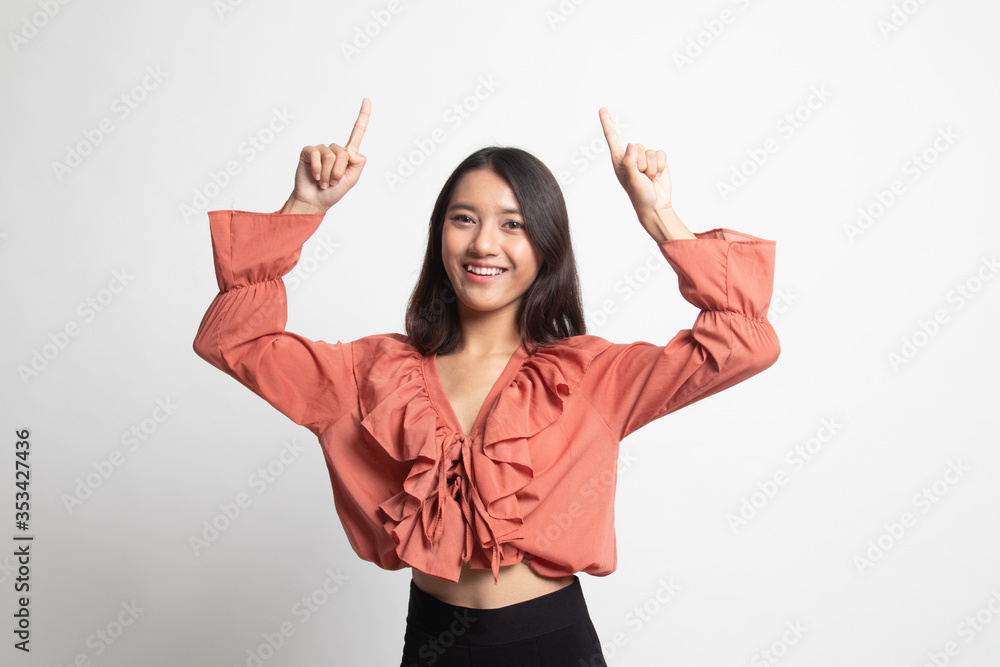 Young Asian woman point to blank space . Young Asian woman point to blank space .