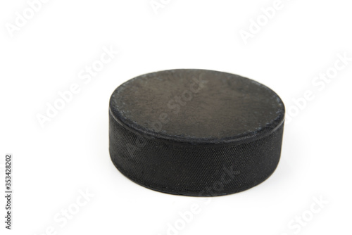 Ice hockey puck on a white background
