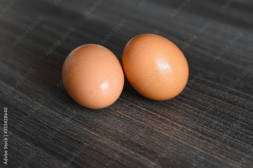 Chicken eggs. - Brown chicken eggs. Healthy protein breakfast. Fresh raw organic chicken eggs. Chicken eggs. - Brown chicken eggs. Healthy protein breakfast. Fresh raw organic chicken eggs.
